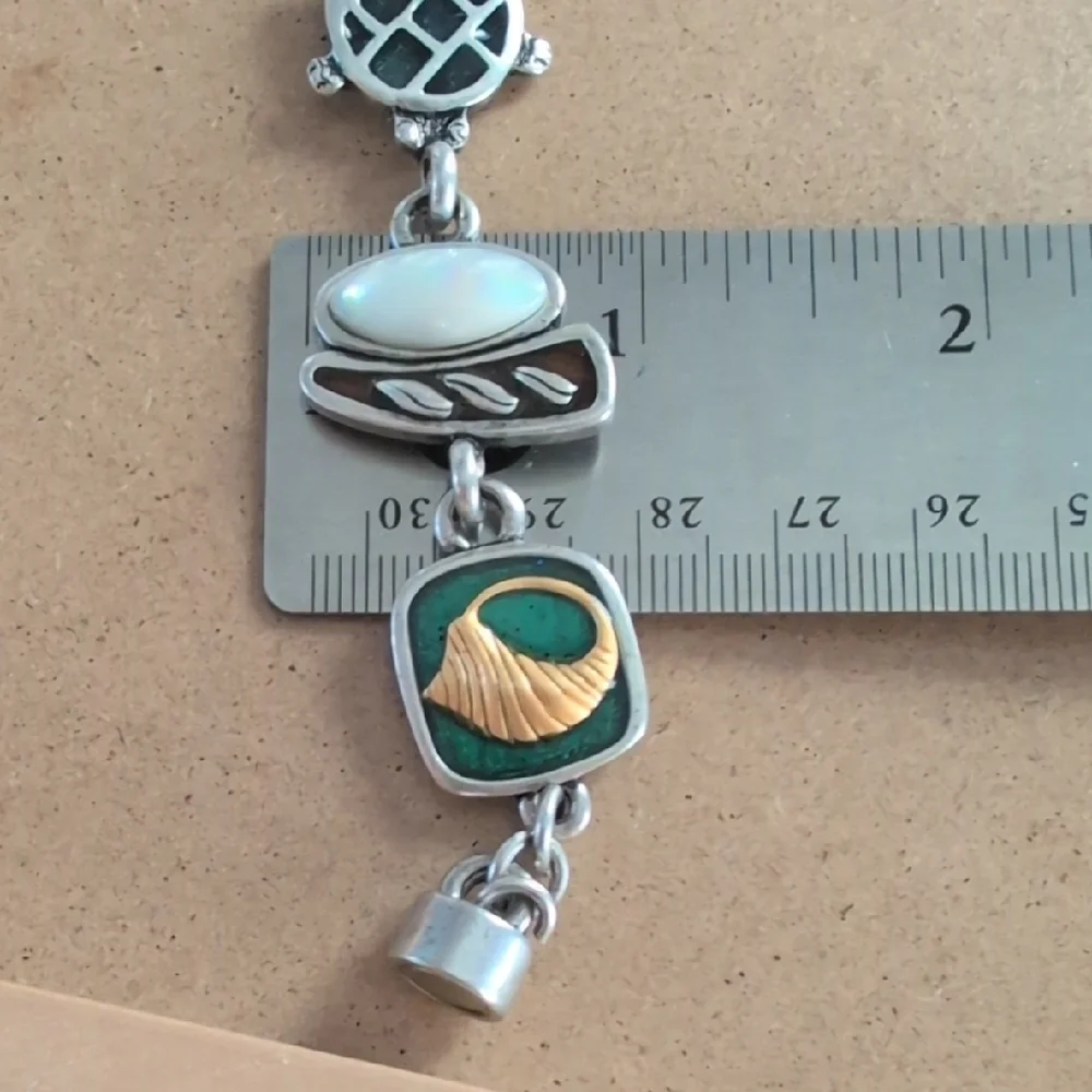 Artisan Silver and Gold Charm Bracelet